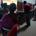 People in que to apply online voter id in india
