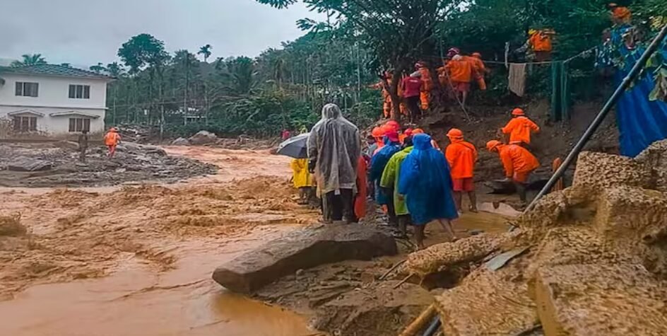 A landslide in the mountainous region of Wayanad, Kerala, showcasing the devastating aftermath and rescue efforts.