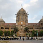 Chhatrapati Shivaji Maharaj Terminus in Mumbai, headquarters of Central Railway. AI image grounded in a real Wikimedia Commons photo by Joe Ravi.