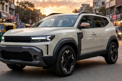 Renault Duster Strong Hybrid SUV on an Indian street at sunset.