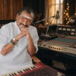 Music composer Deva. Photo: Santhosh2903 / Wikimedia Commons (CC BY-SA 4.0), background composite.