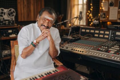 Music composer Deva. Photo: Santhosh2903 / Wikimedia Commons (CC BY-SA 4.0), background composite.