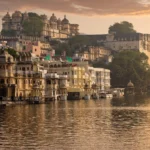Udaipur Lake Pichola and City Palace at sunset.