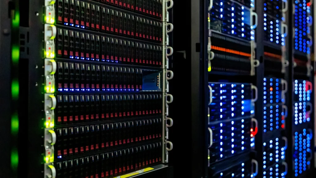Close view of server racks with status lights.