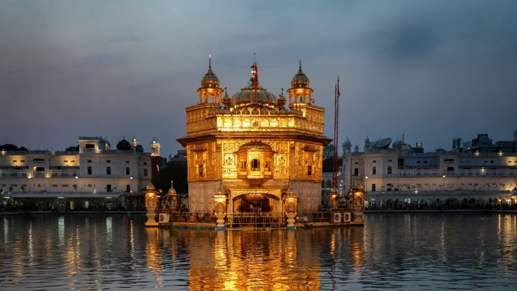 The Golden Temple in Amritsar at dusk (photo: Bernard Gagnon / Wikimedia Commons, CC BY-SA 4.0; AI composite)