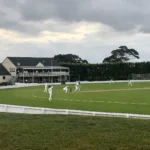 Bert Sutcliffe Oval, Lincoln, venue of the India A vs New Zealand A 1st unofficial Test (ground reference photo: Mike Dickison / Wikimedia Commons, CC BY-SA 4.0; AI composite)