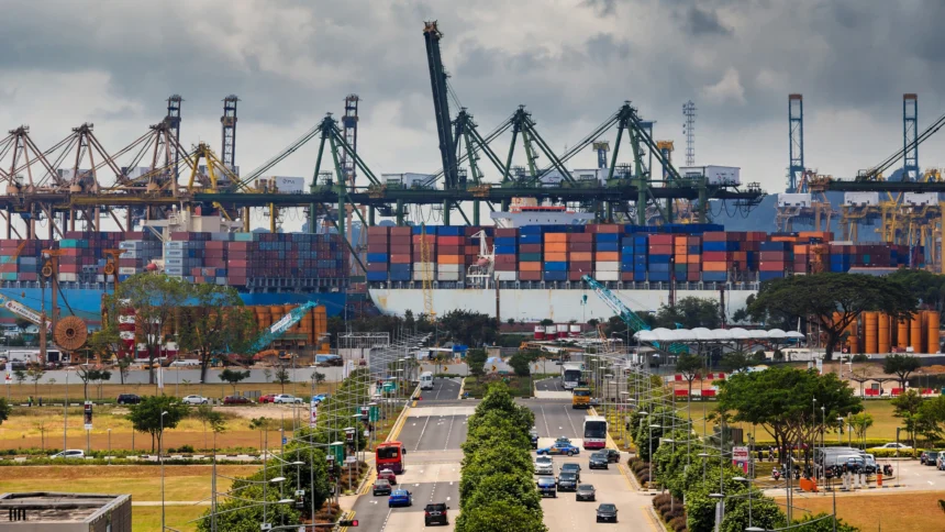 Container ships and cranes at a container terminal, representing India-Mexico trade. Image generated from a real Wikimedia Commons reference photo.