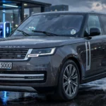 Range Rover Electric charging at a fast-charging station