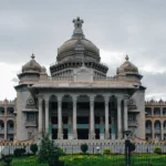 Vidhana Soudha, Bengaluru. AI-generated image grounded in a real photo by Moheen Reeyad / Wikimedia Commons.