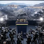 Editorial illustration of a press conference on the Singareni coal controversy