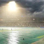 M. Chinnaswamy Stadium, Bengaluru, during the rain-hit IND vs WI T20 decider (Photo: Indrashis / Wikimedia Commons, AI composite)