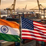 India and US flags at a container port at golden hour