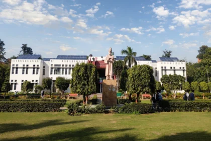 Jamia Millia Islamia campus in Delhi. AI-generated image grounded in a real Wikimedia Commons photo by Wiki1957BOY (CC BY-SA 4.0).