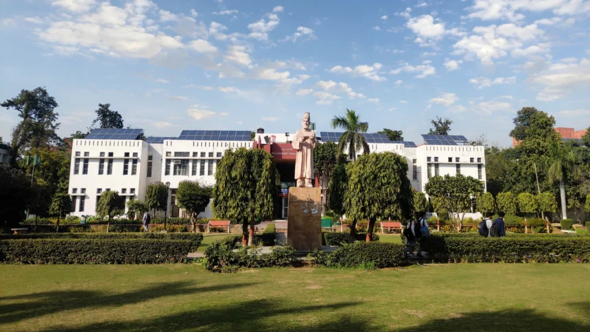 Jamia Millia Islamia campus in Delhi. AI-generated image grounded in a real Wikimedia Commons photo by Wiki1957BOY (CC BY-SA 4.0).