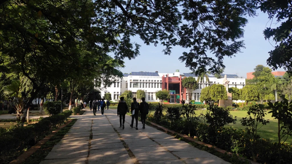 Jamia Millia Islamia campus in Delhi. AI-generated image grounded in a real Wikimedia Commons photo by Wiki1957BOY (CC BY-SA 4.0).