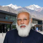 Prime Minister Narendra Modi - Ladakh development projects inauguration. Photo: Prime Minister's Office / Wikimedia Commons (background composite)