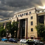 Reserve Bank of India headquarters in Mumbai. Photo: Anurag Vijay 03 / Wikimedia Commons (AI composite background)