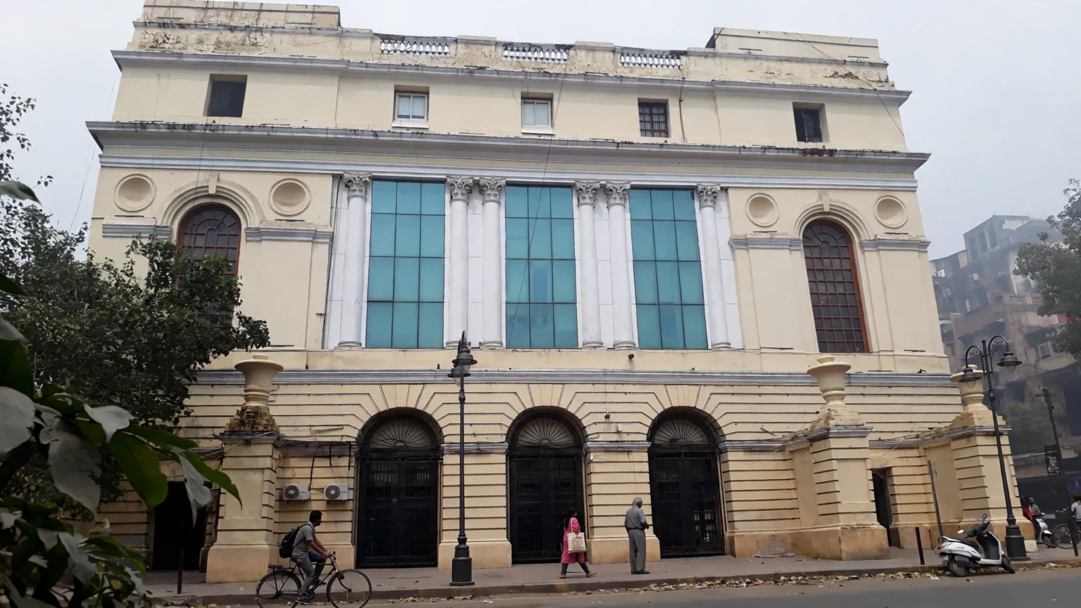 State Bank of India branch building (reference photo: Wikimedia Commons, AI editorial rendering).