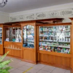 Medicine boxes on pharmacy shelves