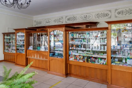 Medicine boxes on pharmacy shelves