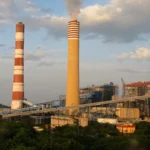 NTPC thermal power plant with twin chimneys.
