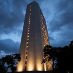 Reserve Bank of India tower in Mumbai lit up at dusk