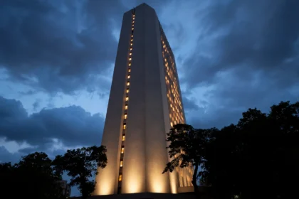 Reserve Bank of India tower in Mumbai lit up at dusk