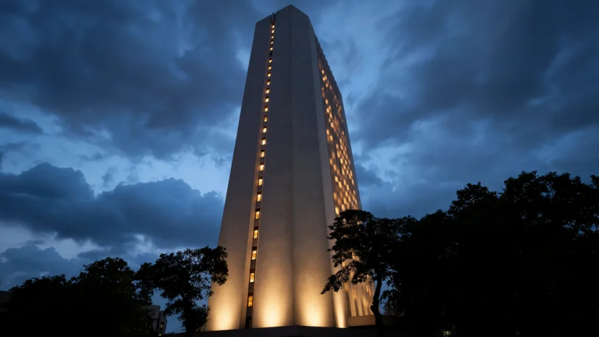 Reserve Bank of India tower in Mumbai lit up at dusk