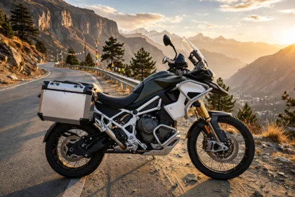 2027 Triumph Tiger 1200 adventure motorcycle on a mountain highway.