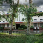 Dholpur House in New Delhi, the headquarters of the Union Public Service Commission. Photo: Ramesh lalwani / Wikimedia Commons (background composite)
